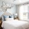 1-Bedroom Luxury Apartments in Wesley Chapel, FL - Aventon Meadows - Bedroom with Bed, Nightstands with Lamps, and Window with Blinds.